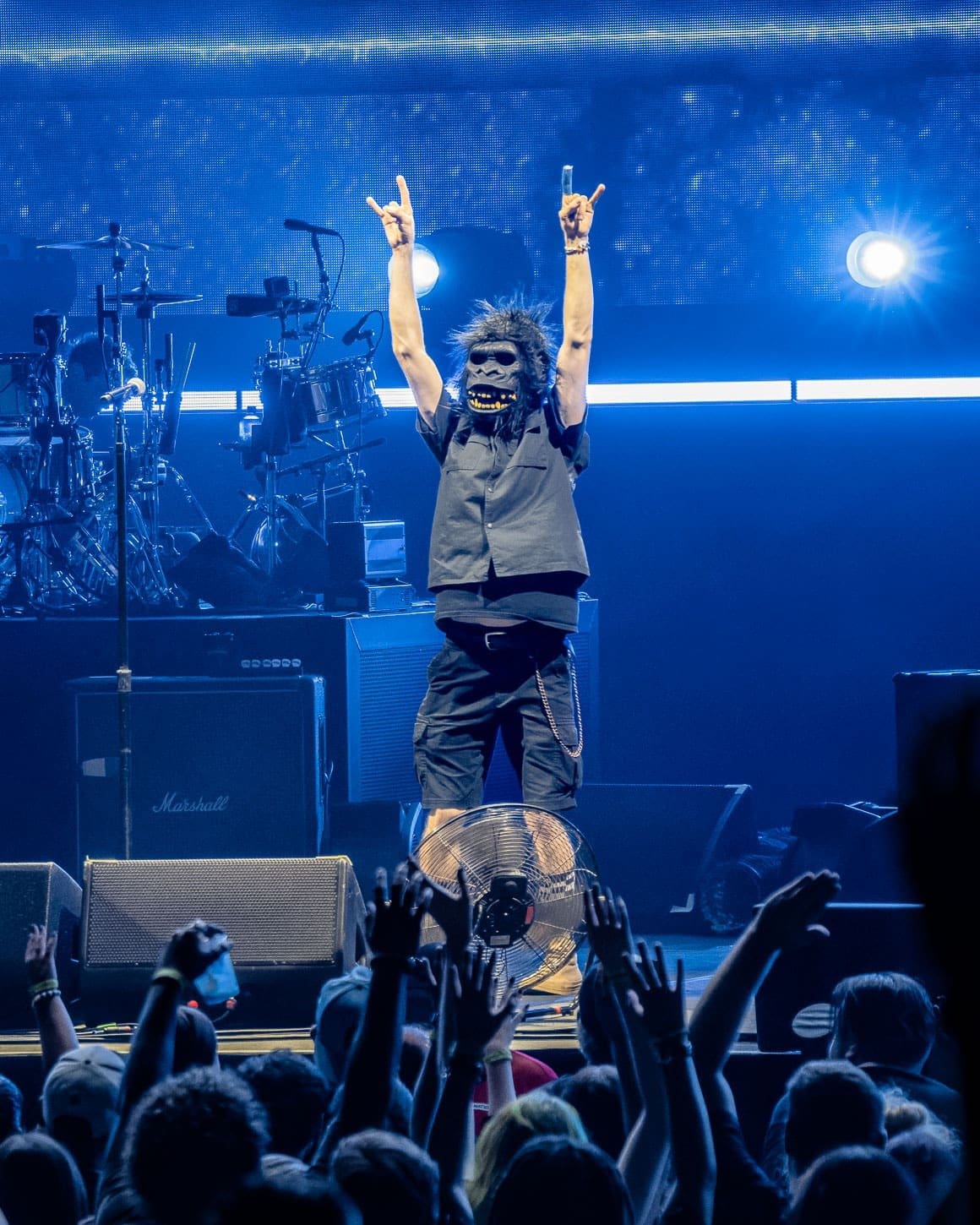 A gorilla shoots t-shirts into the crowd before The offspring takes the stage.
